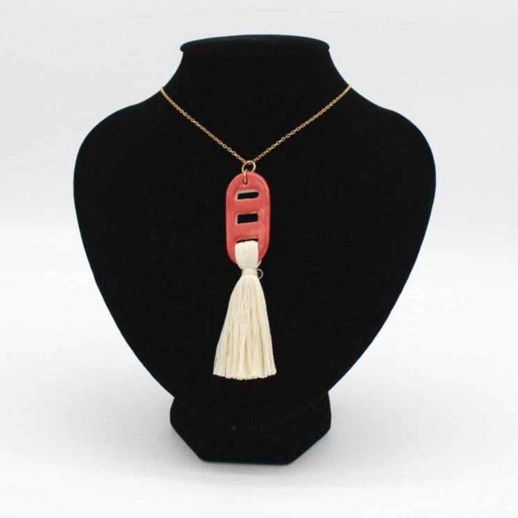 Coral ceramic necklace with Raw fringes.