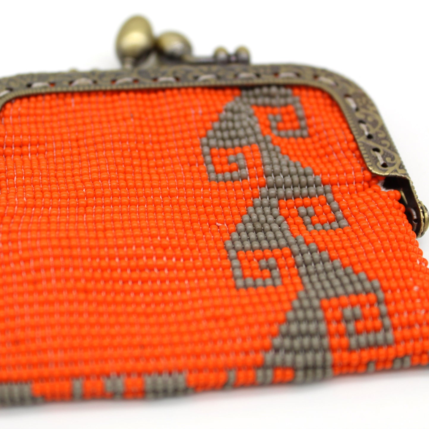 Glass bead coin purse with metal frame - Storm Orange